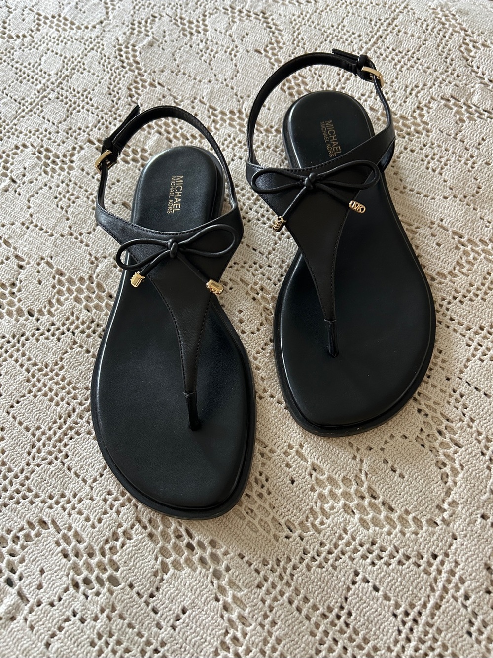 Michael Kors Black Bow T-Strap Sandals with Gold Charms